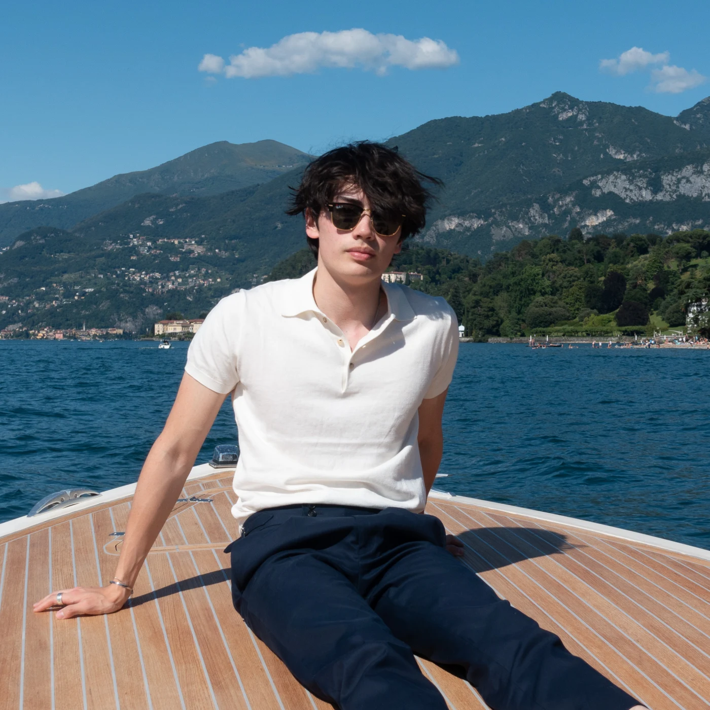 Benetti white polo photographed on Lake Como